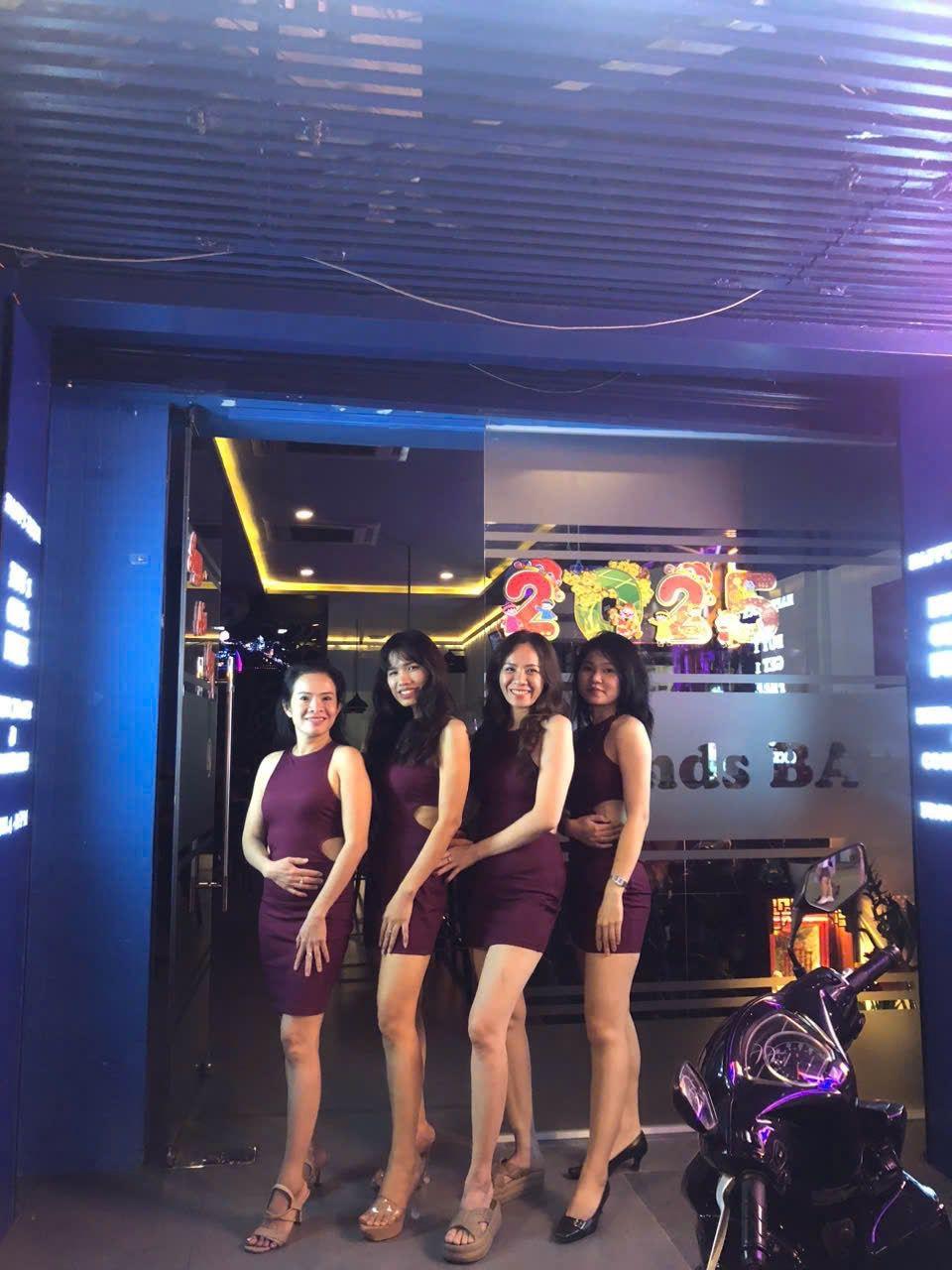 Friends Bar girls at entrance